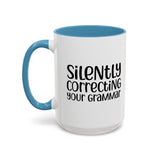 Mug Silently Correcting Your Grammar