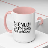 Mug Silently Correcting Your Grammar