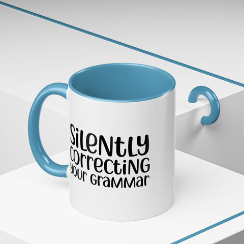 Mug Silently Correcting Your Grammar